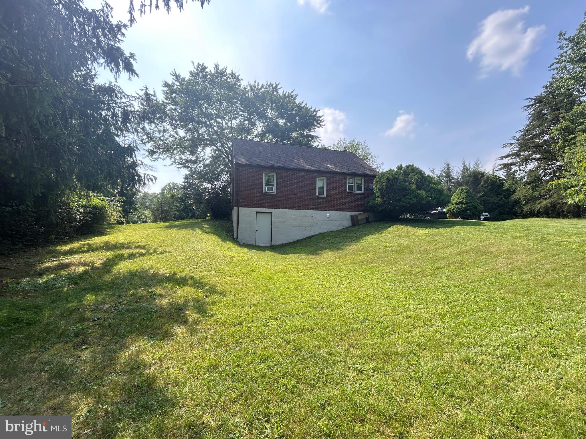 1452 Welsh Road Reading, PA 19607 - Photo 8 of 28 a view of a house with a yard
