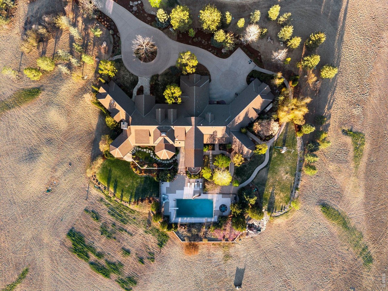 15383 East County Line Road Berthoud, CO 80513 - Photo 44 of 47 an aerial view of houses and roads