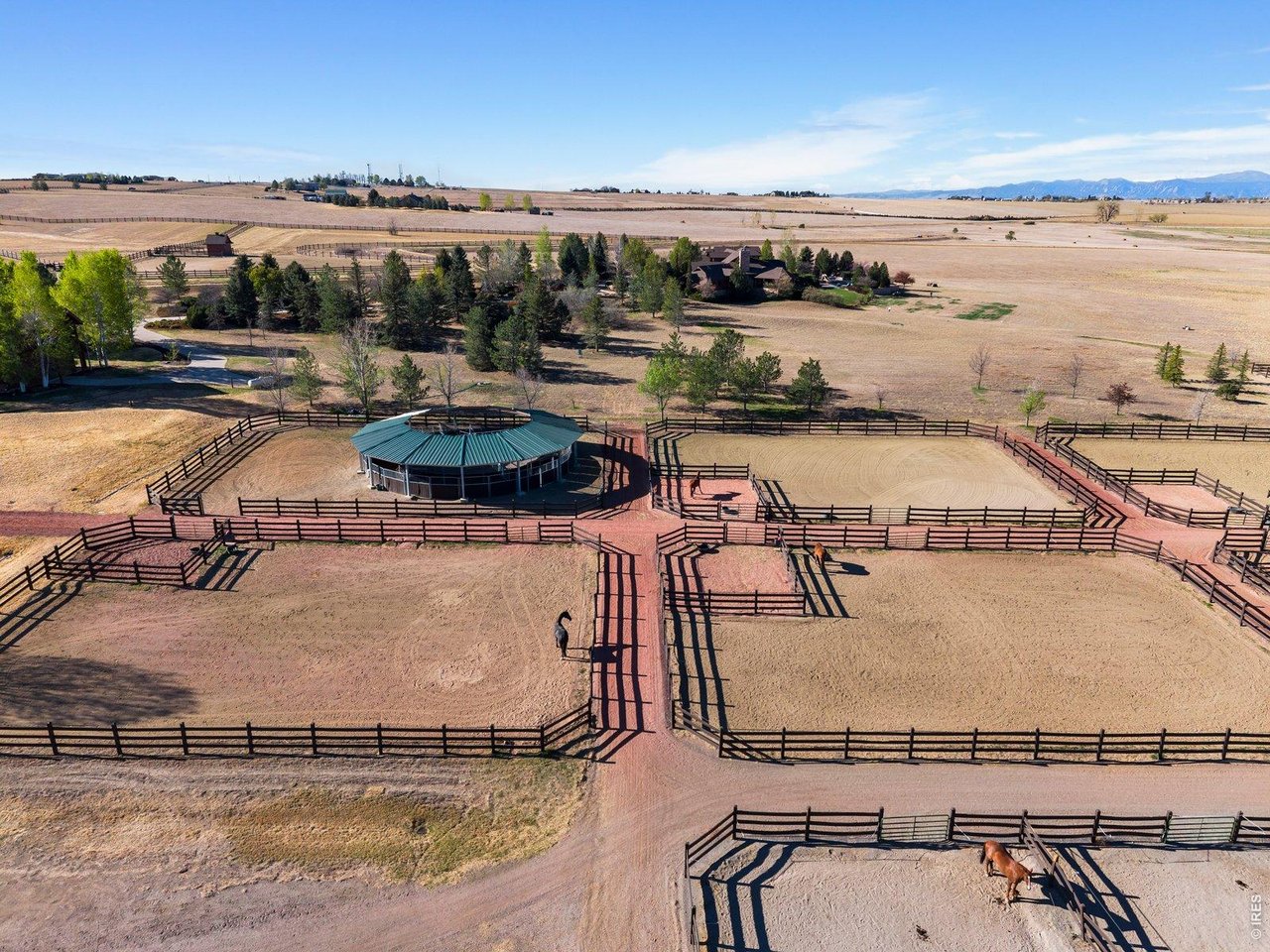 15383 East County Line Road Berthoud, CO 80513 - Photo 7 of 47 a view of a swimming pool and an ocean view