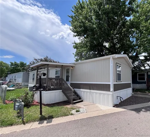 a front view of a house with yard