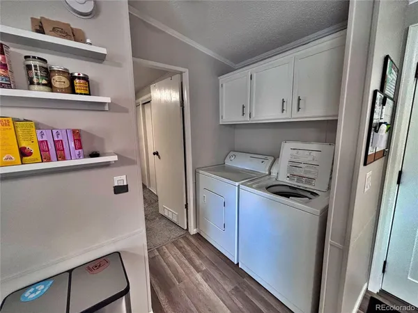 a bed room with a bed and a television