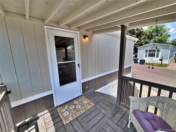 a bedroom with bed and window