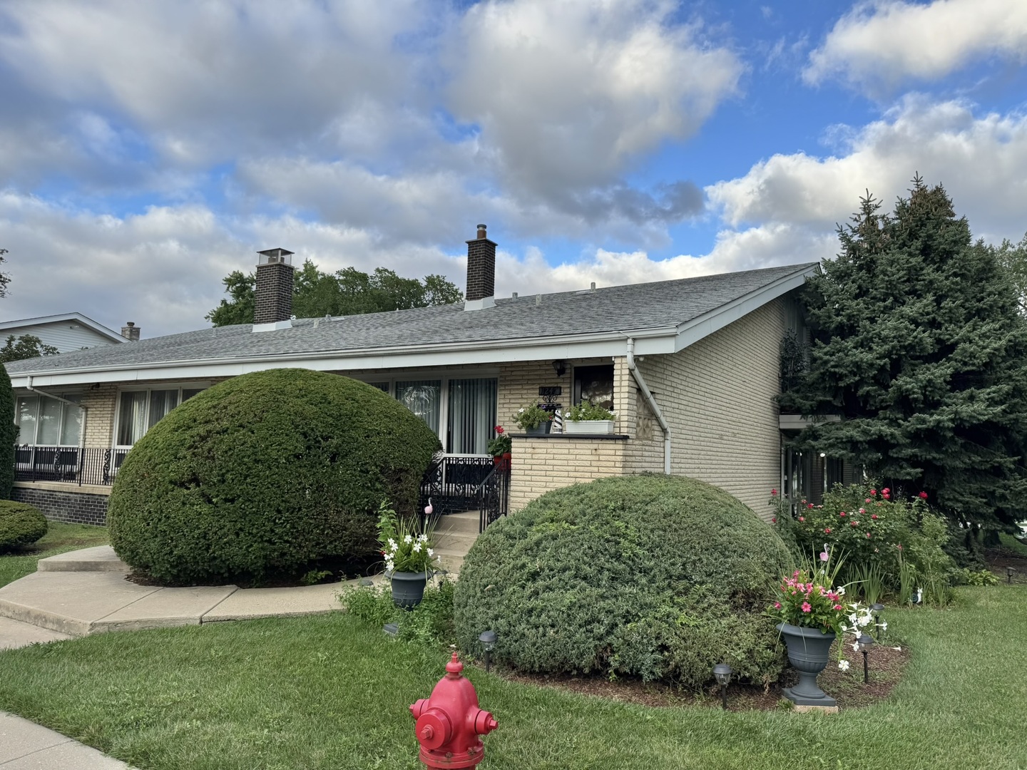 a view of a house with a garden