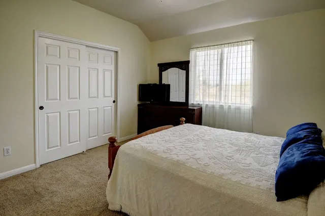 a utility room with closet dryer and washer