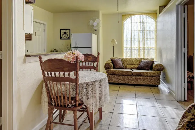 a kitchen with stainless steel appliances a sink and cabinets
