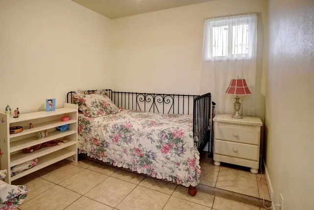 a view of house with backyard