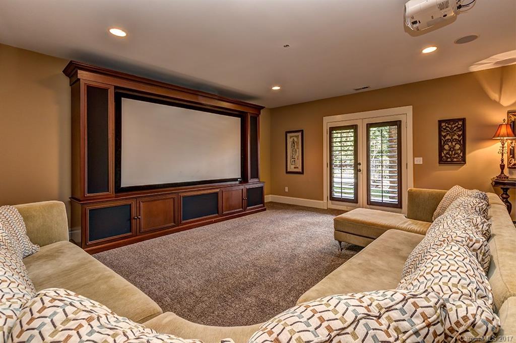 378 Elis Way Fort Mill, SC 29708 - Photo 22 of 23 a living room with a couch and a flat screen tv