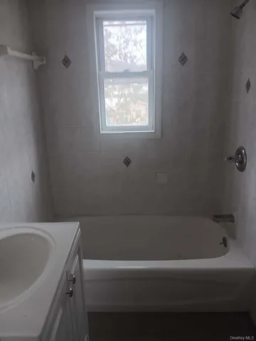 a utility room with washer and dryer