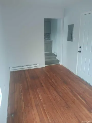 a view of staircase with white walls