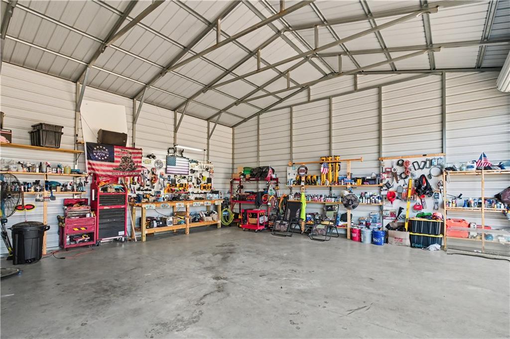 1833 Tom Odum Road Vidalia, GA 30474 - Photo 51 of 59 a view of a storage room with utility room