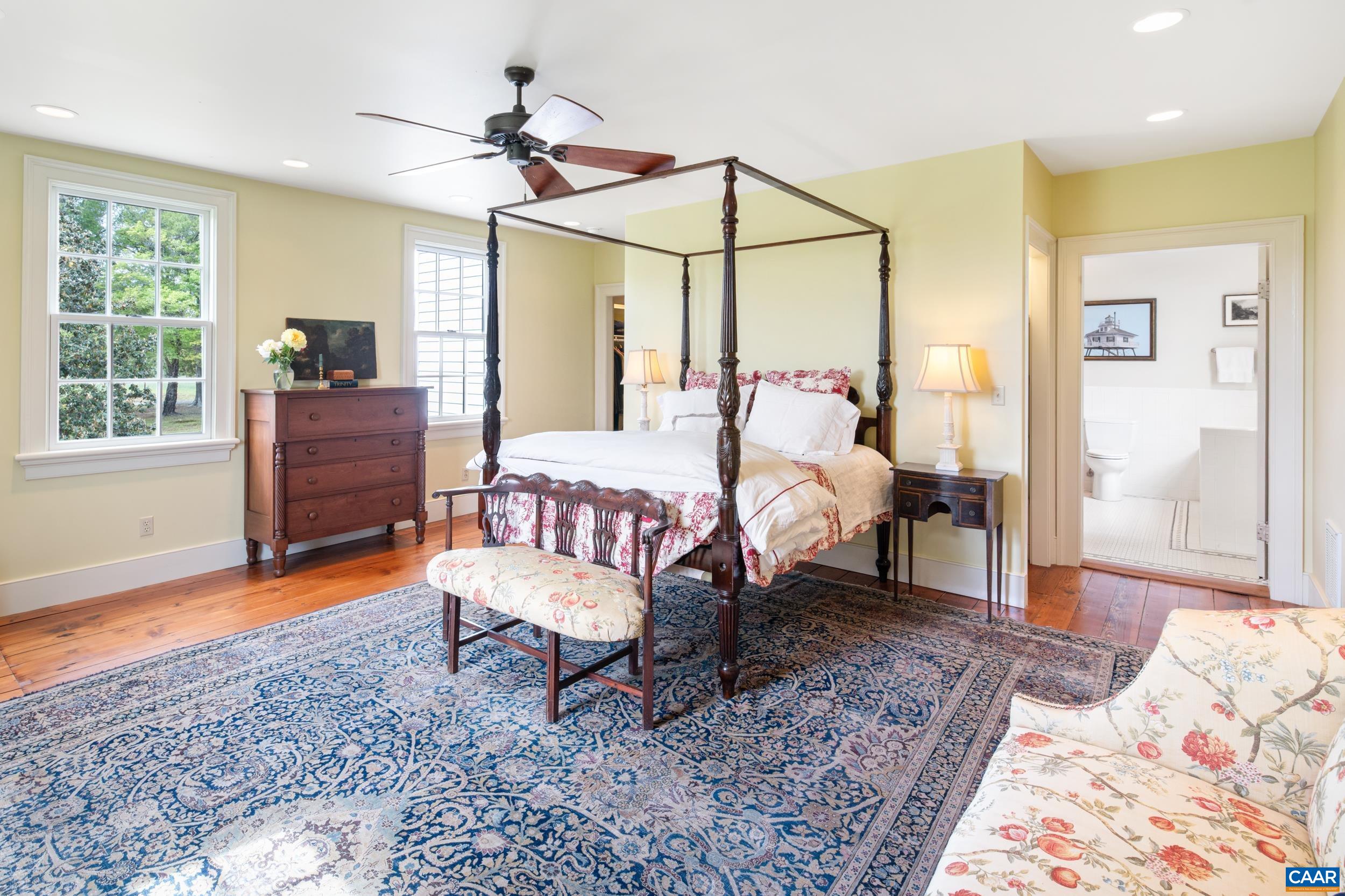 3276 Buckingham Springs Road Dillwyn, VA 23936 - Photo 25 of 47 a bedroom with a bed and wooden floor