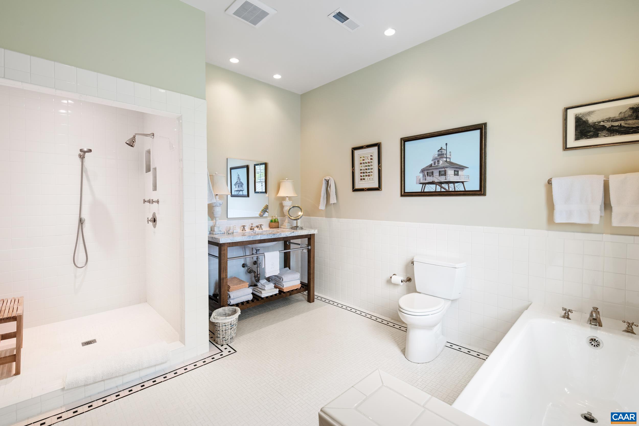3276 Buckingham Springs Road Dillwyn, VA 23936 - Photo 26 of 47 a bathroom with a tub sink toilet and shower