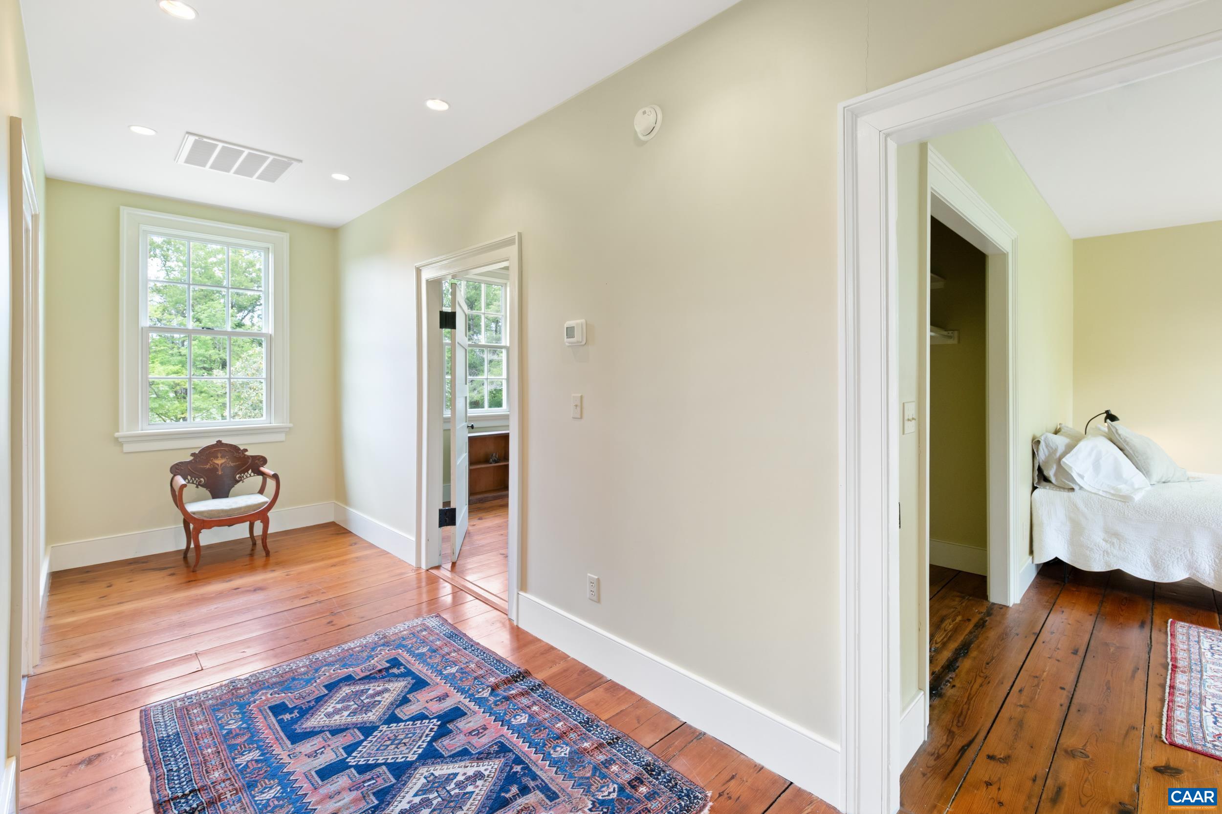 3276 Buckingham Springs Road Dillwyn, VA 23936 - Photo 31 of 47 a view of room with wooden floor and furniture