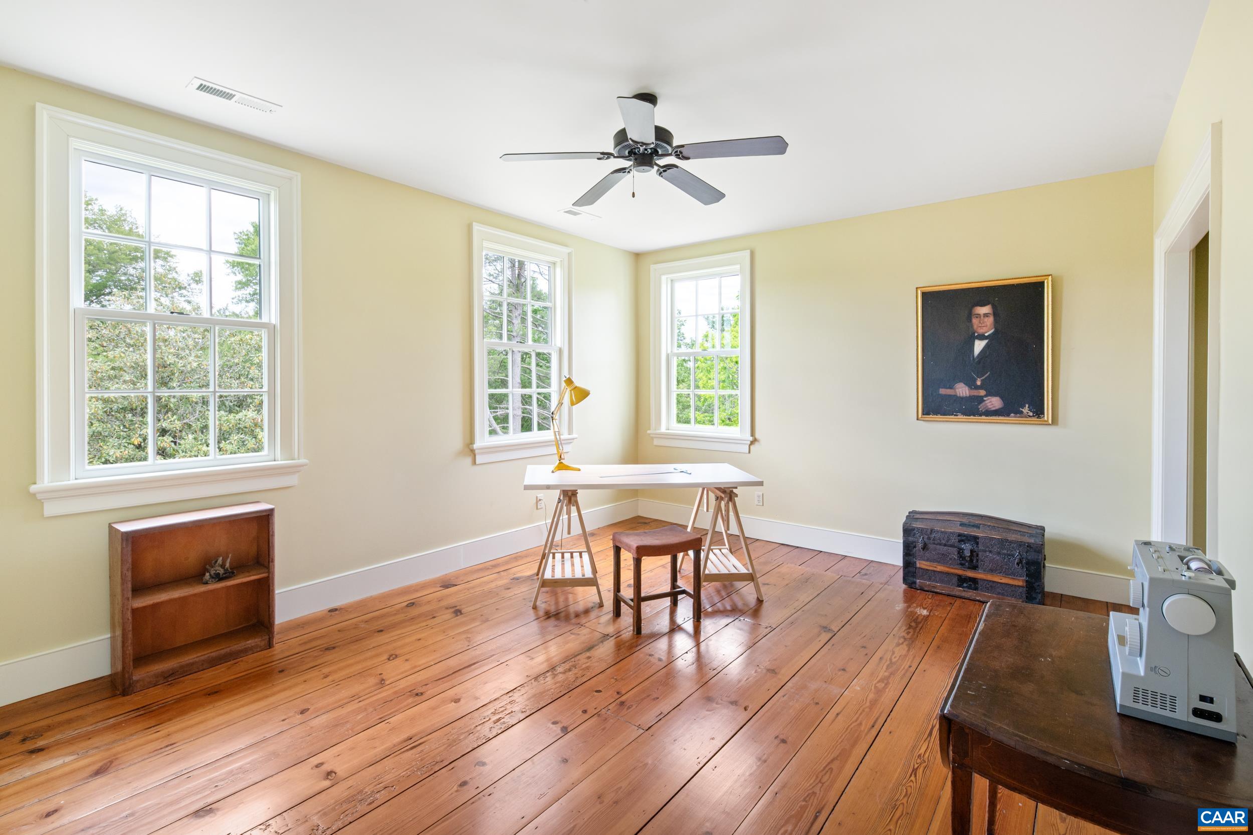 3276 Buckingham Springs Road Dillwyn, VA 23936 - Photo 35 of 47 a view of a dining room with furniture window and wooden floor