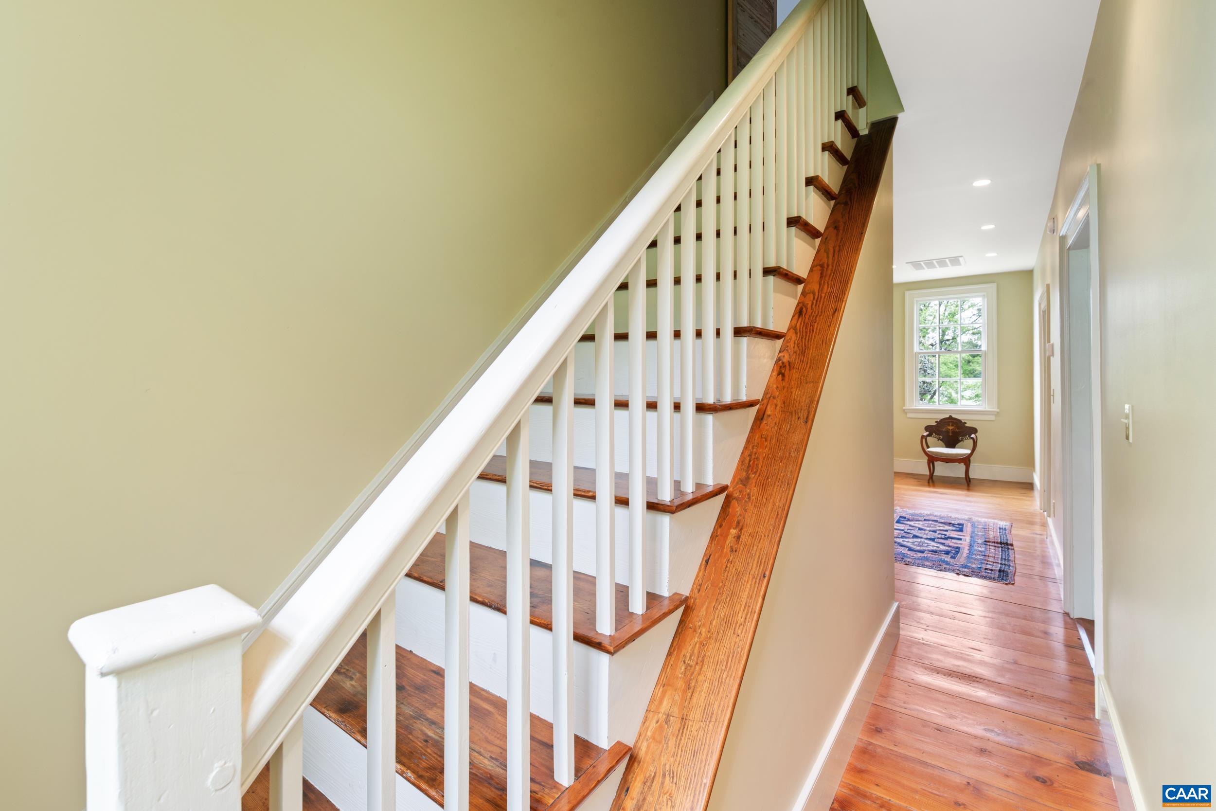 3276 Buckingham Springs Road Dillwyn, VA 23936 - Photo 37 of 47 a view of staircase with wooden floor and a rug