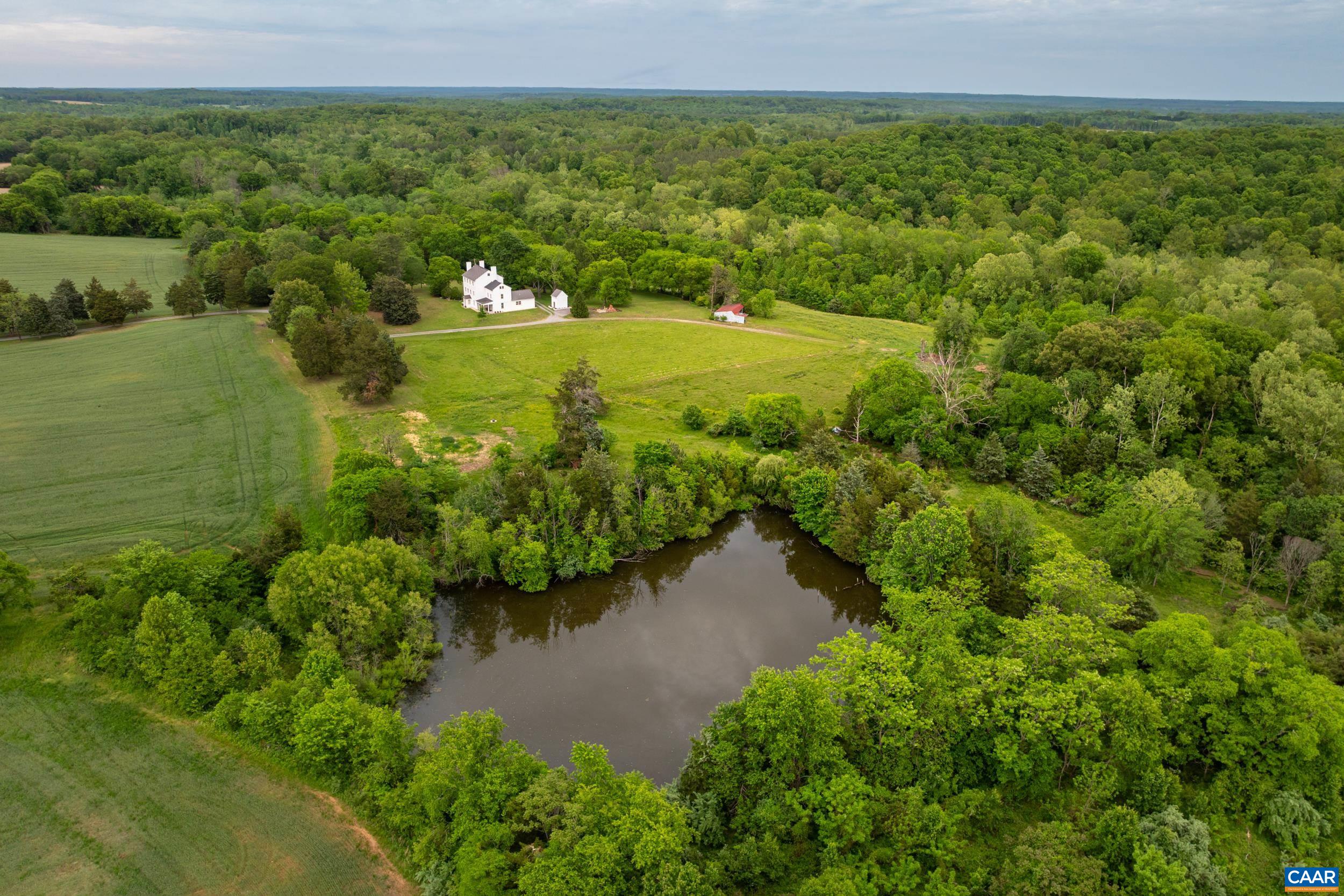 3276 Buckingham Springs Road Dillwyn, VA 23936 - Photo 40 of 47 a view of a lake with a city