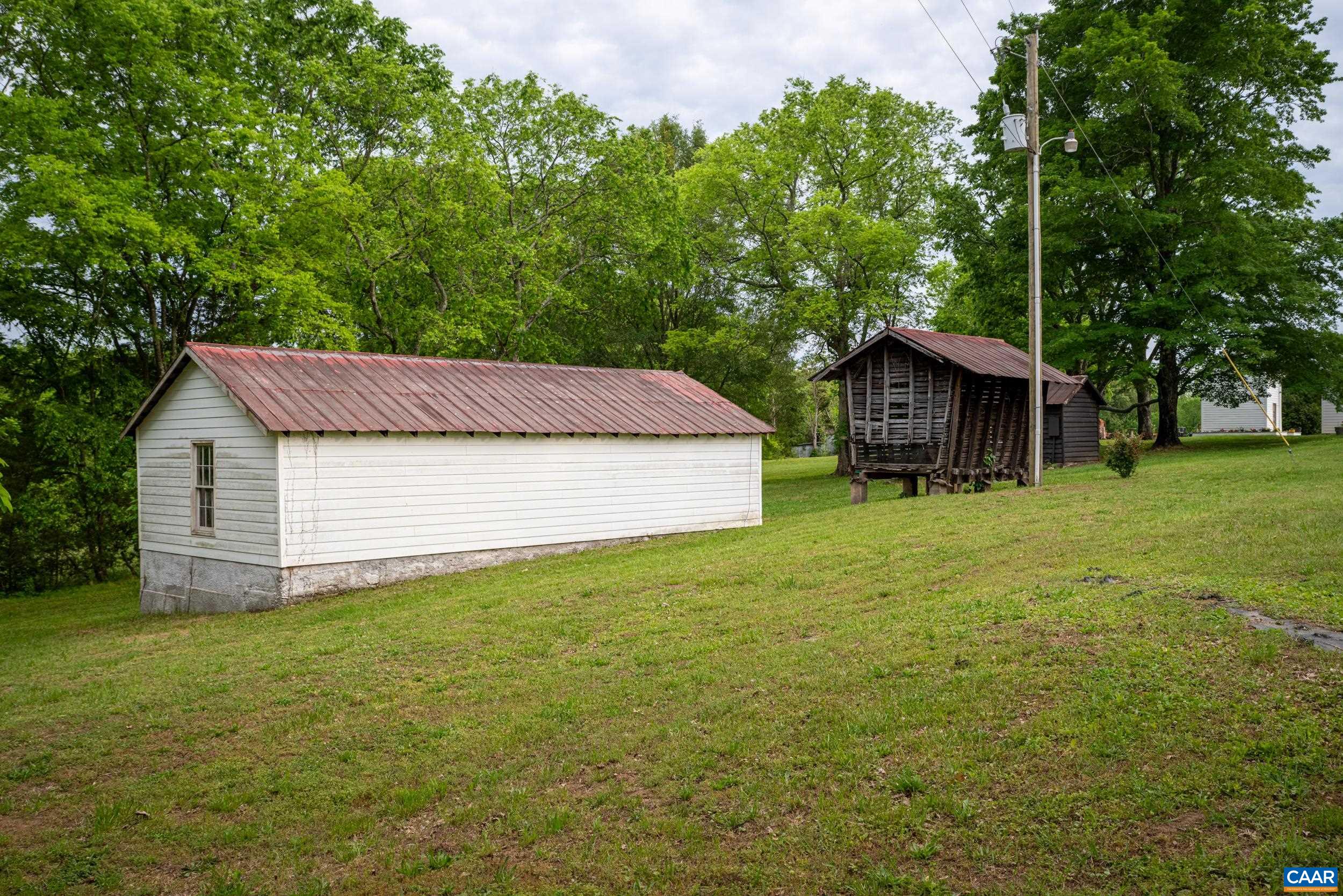 3276 Buckingham Springs Road Dillwyn, VA 23936 - Photo 45 of 47 a view of a house with a yard