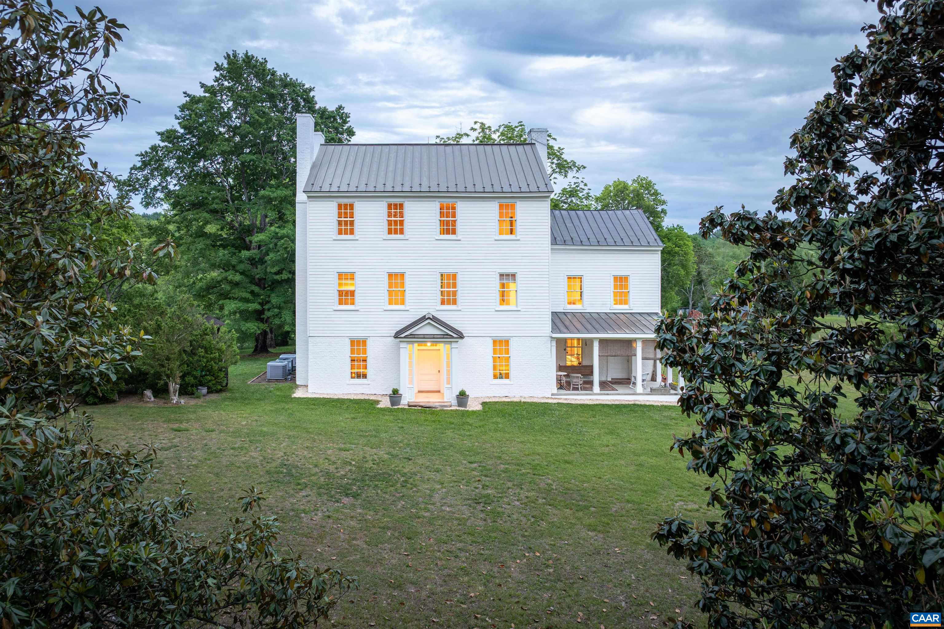 3276 Buckingham Springs Road Dillwyn, VA 23936 - Photo 46 of 47 a front view of house with yard and trees in the background