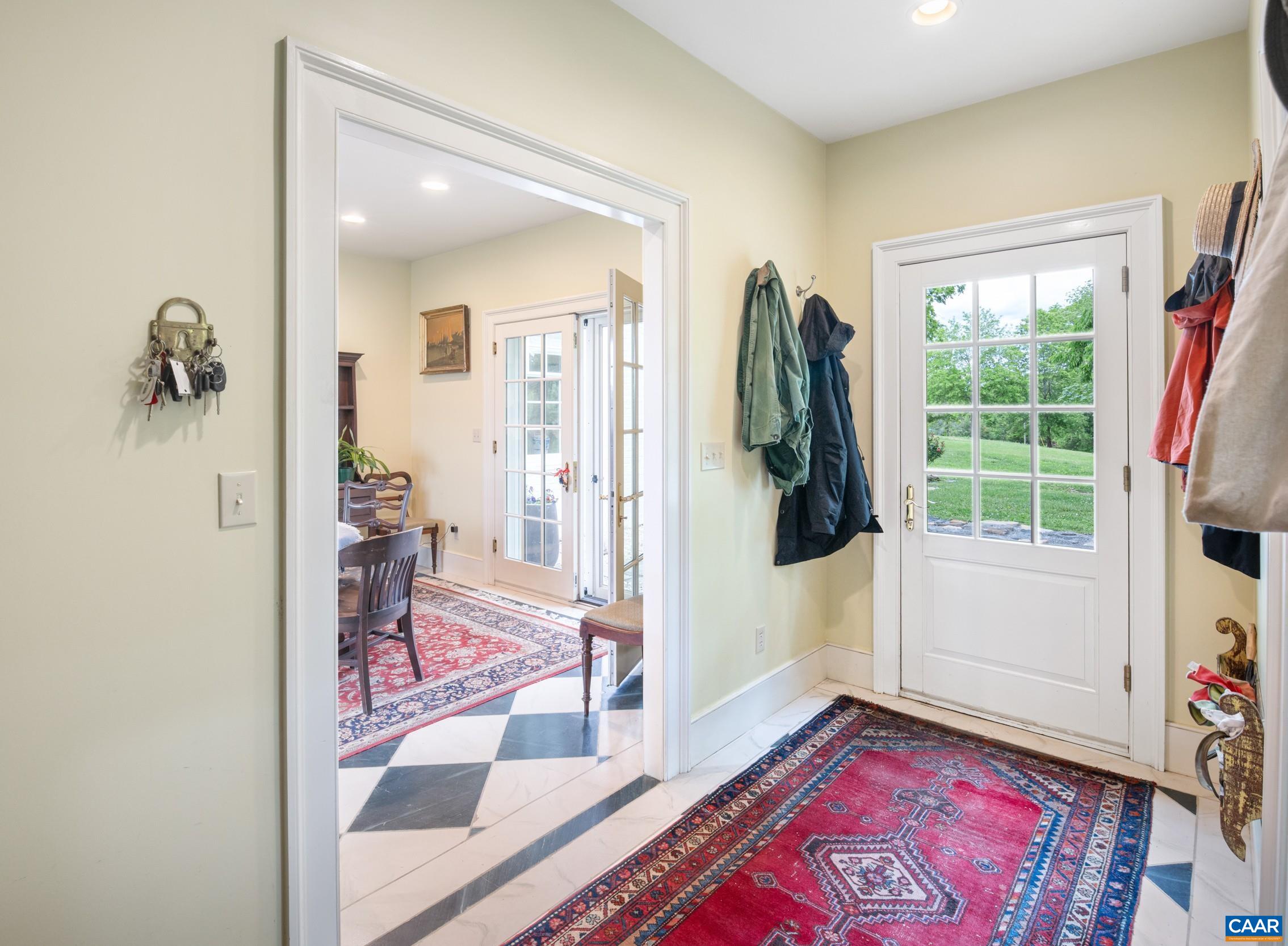 3276 Buckingham Springs Road Dillwyn, VA 23936 - Photo 6 of 47 a view of a hallway and a livingroom with furniture