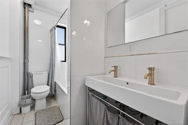 $399,000 | 42-22 Ketcham Street, Unit F16 | Elmhurst