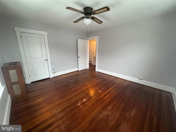 a view of a livingroom with a hardwood floor