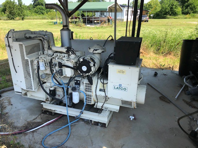 414 Lee Road Bell Buckle, TN 37020 - Photo 5 of 10 a room with gym equipment and large mirror