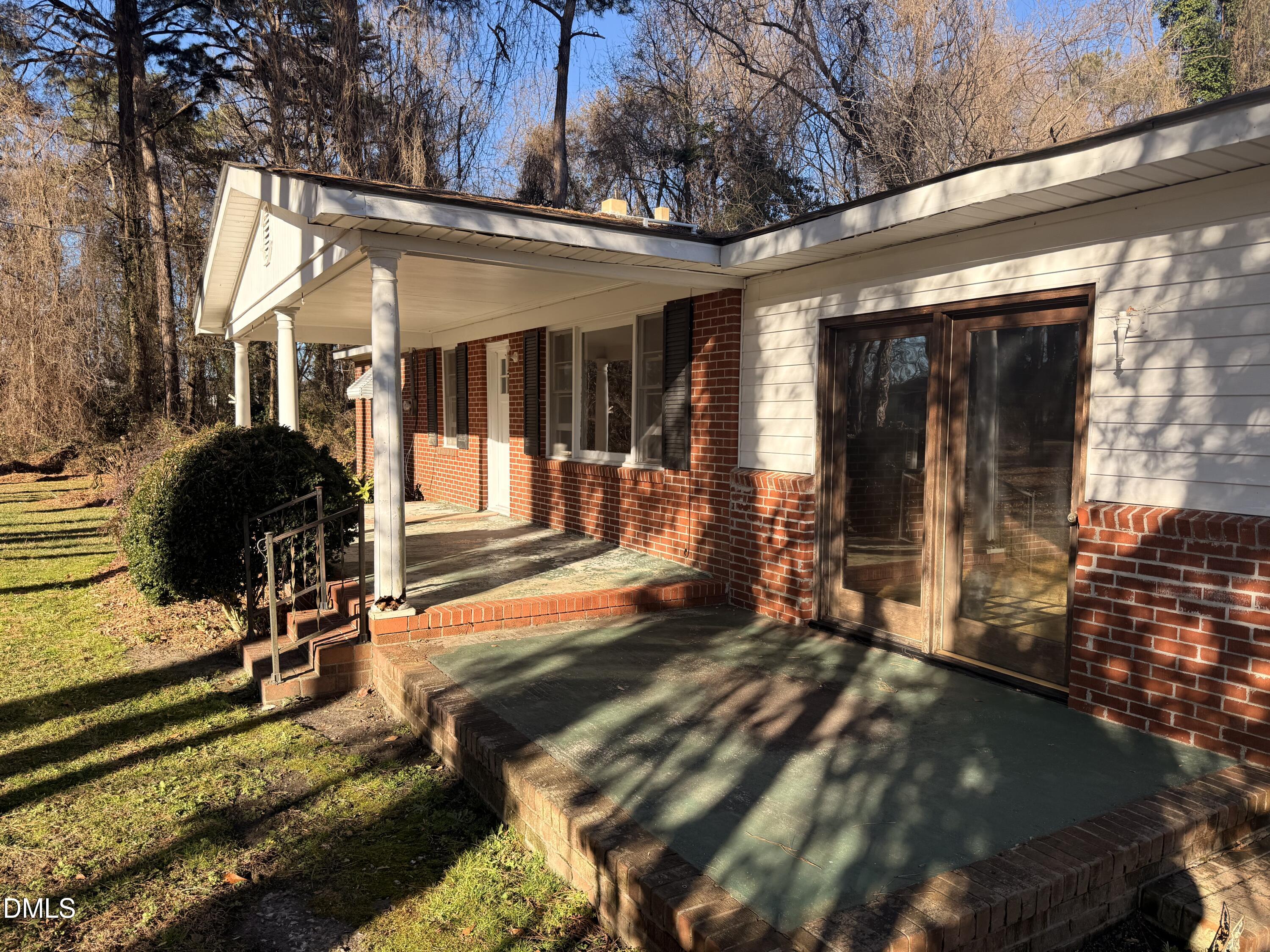 8066 Springfield School Road Kenly, NC 27542 - Photo 2 of 11 a view of a house with backyard stove and sitting area