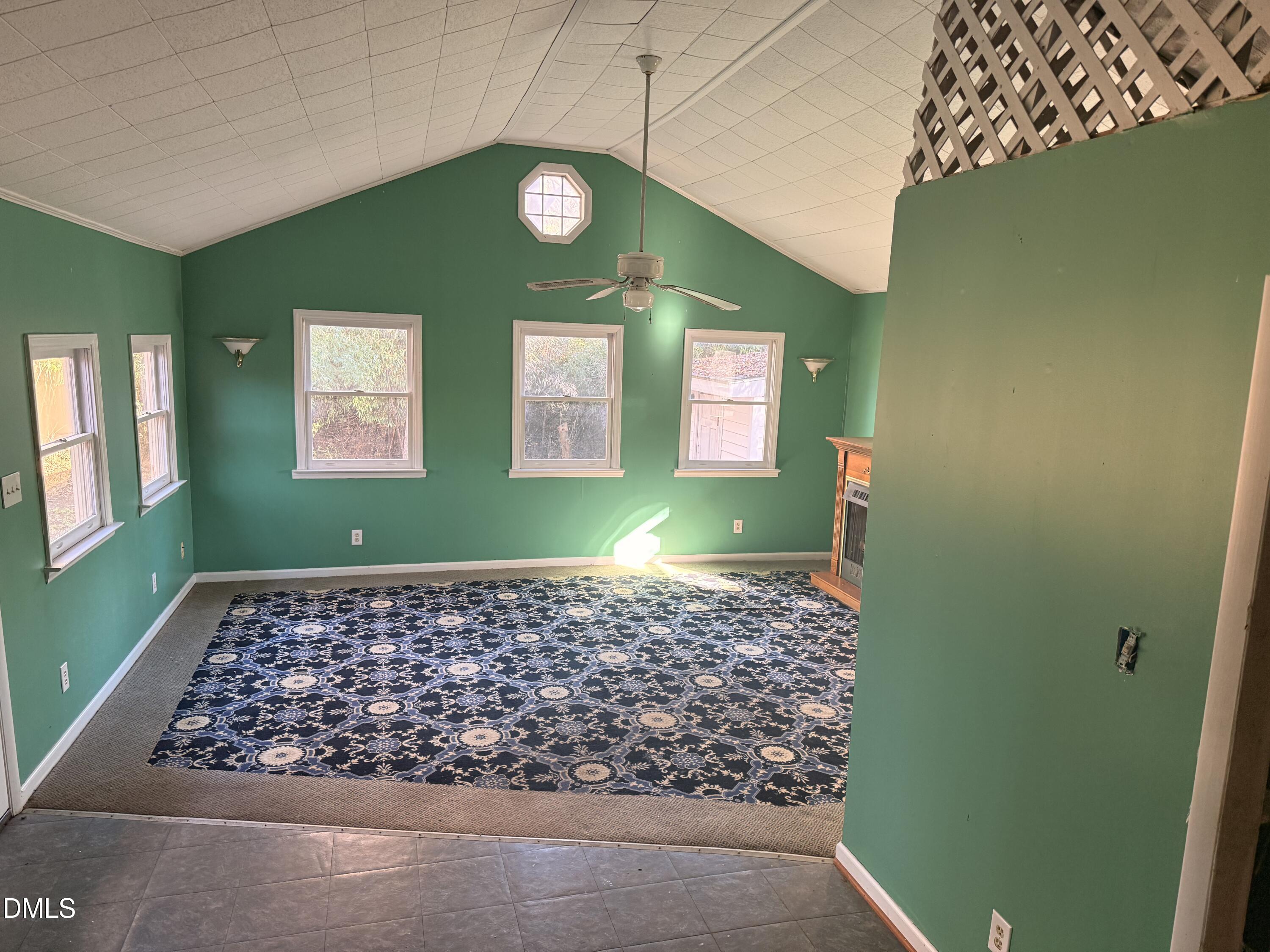 8066 Springfield School Road Kenly, NC 27542 - Photo 7 of 11 a view of empty room with window and ceiling fan