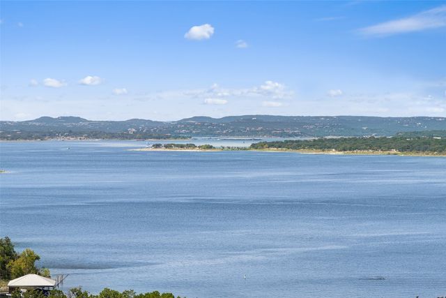 a view of mountain with lake view