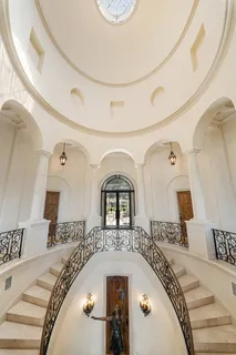 a view of a entryway with wooden floor