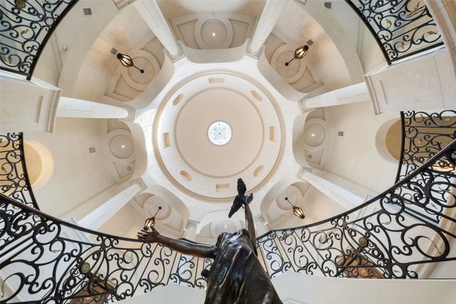 a view of living room filled with furniture and rug floor