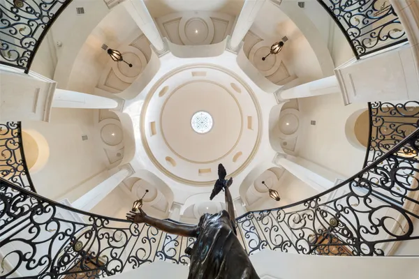 a view of living room filled with furniture and rug floor
