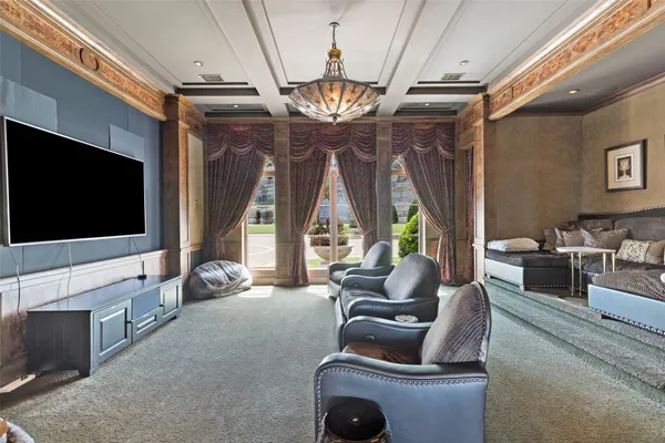 a spacious bedroom with a bed and a large window