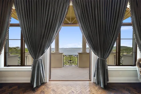 a spacious bathroom with a bathtub shower and sink