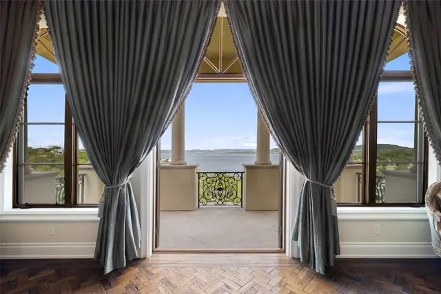 a spacious bathroom with a bathtub shower and sink