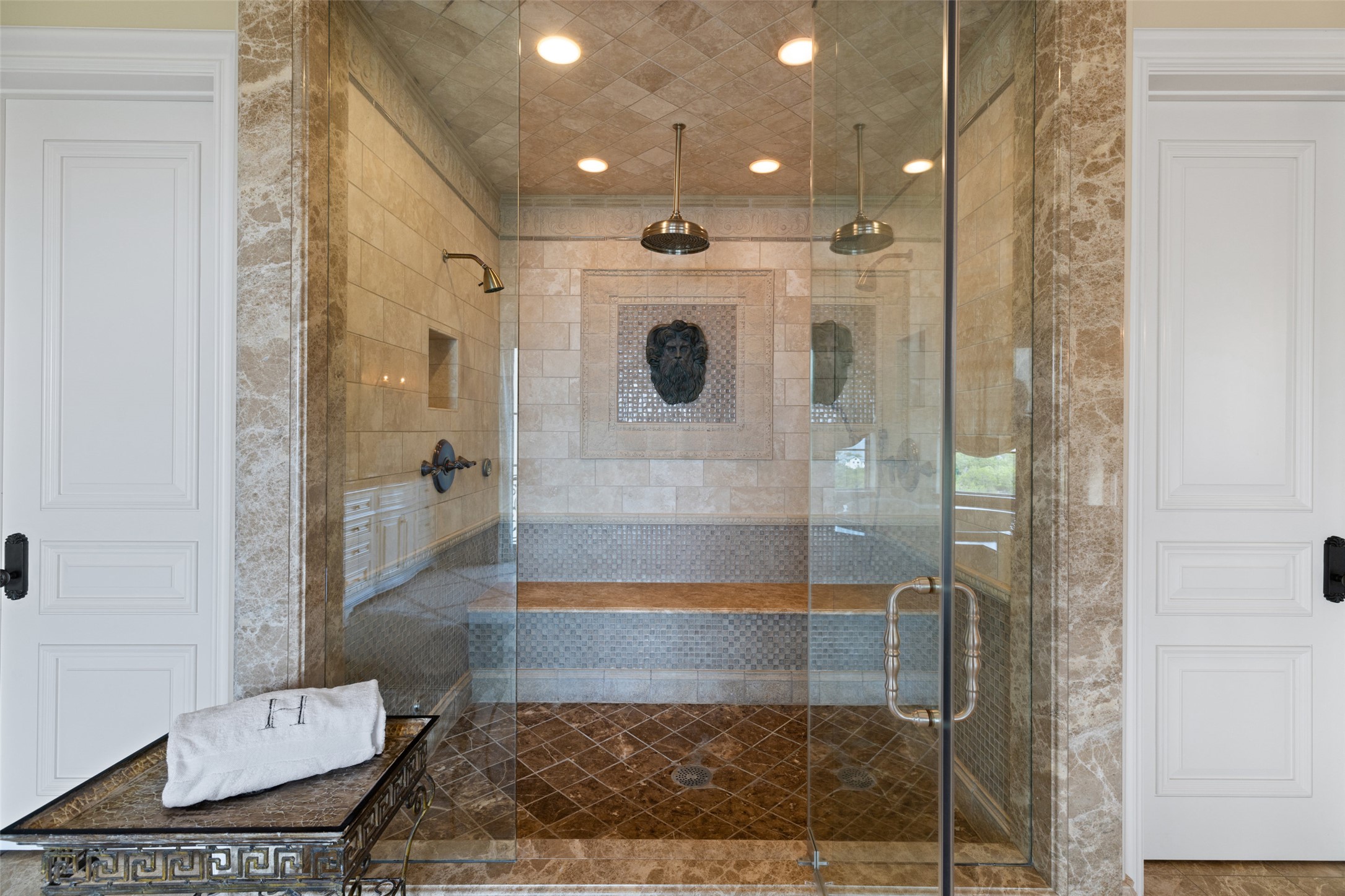 12400 Cedar Street Austin, TX 78732 - Photo 25 of 39 a bathroom with a glass shower door