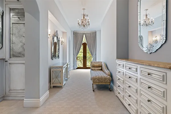 a view of a chairs and table in a balcony
