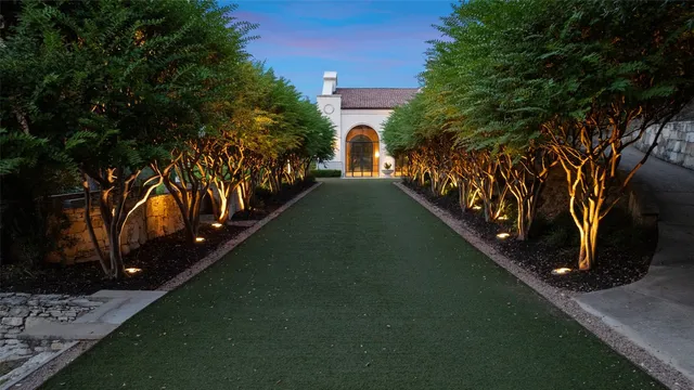 a view of a lake with a house in the background