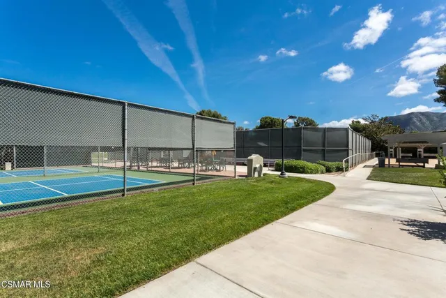 a view of swimming pool with outdoor seating