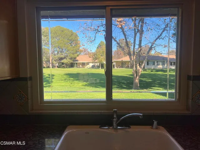 a view of a room and window