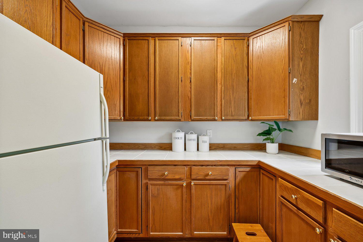 13120 Esworthy Road Potomac, MD 20854 - Photo 25 of 80 Butler's Pantry w/Extra Fridge and Cabinets