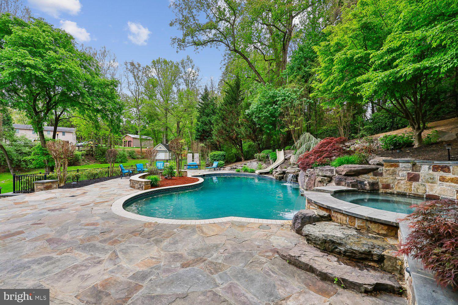 13120 Esworthy Road Potomac, MD 20854 - Photo 29 of 80 Saltwater Pool w/Waterfall and Water Slide