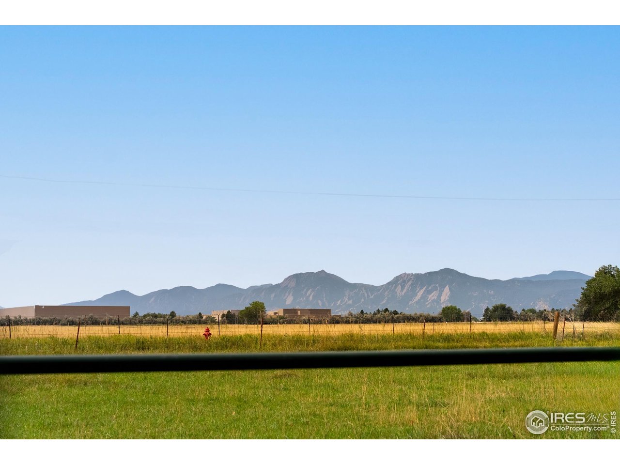 6789 Niwot Road Longmont, CO 80503 - Photo 2 of 28 a view of lake with mountain