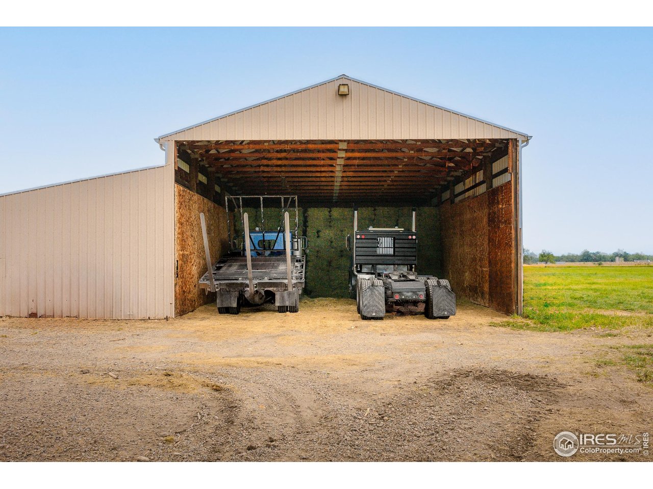 6789 Niwot Road Longmont, CO 80503 - Photo 23 of 28 a view of a livingroom with furniture and a ceiling fan