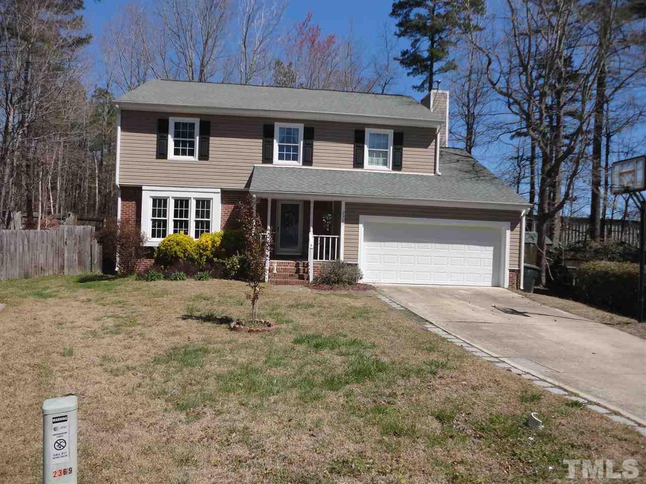 2369 Declaration Drive Raleigh, NC 27615 - Photo 2 of 20 a front view of a house with garden