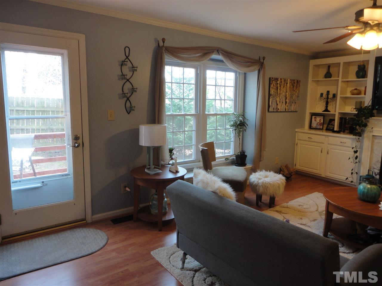 2369 Declaration Drive Raleigh, NC 27615 - Photo 11 of 20 a living room with furniture and a window