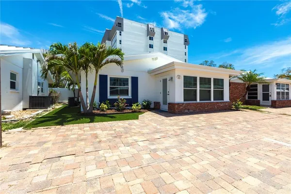 a view of a house with a patio