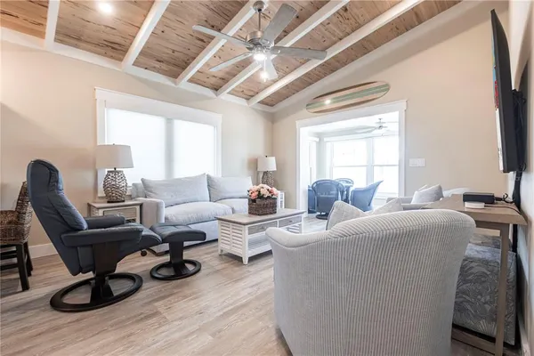 a living room with furniture and a window