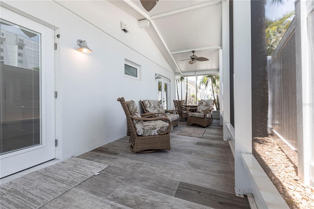 6020 Midnight Pass Road, Unit 39 Sarasota, FL 34242 - Photo 9 of 19 a lobby with furniture and floor to ceiling window