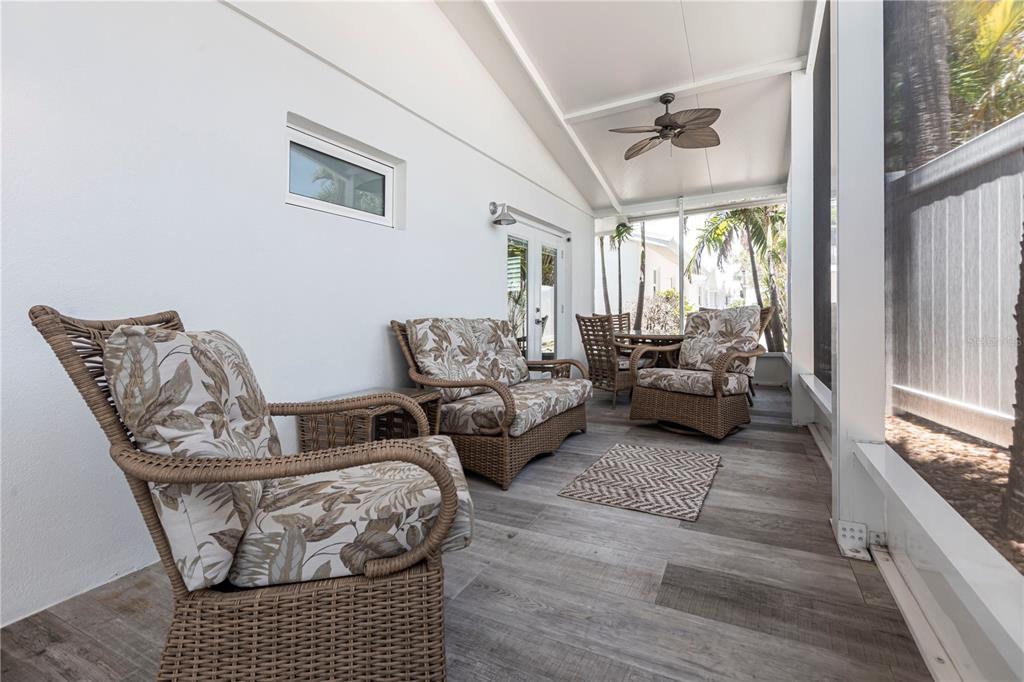 6020 Midnight Pass Road, Unit 39 Sarasota, FL 34242 - Photo 10 of 19 a living room with furniture